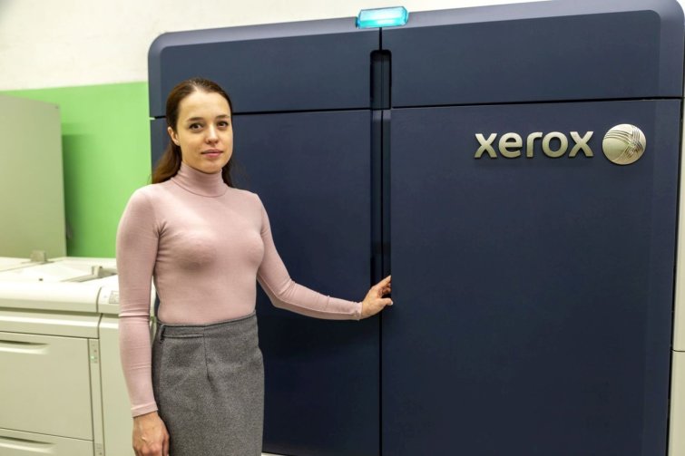   «»         Xerox Iridesse Production Press